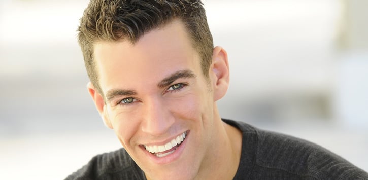 Jeff Civillico smiling during an event presentation