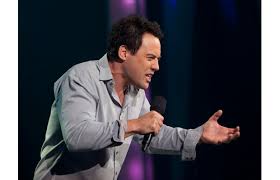 Orny Adams with outstretched arms