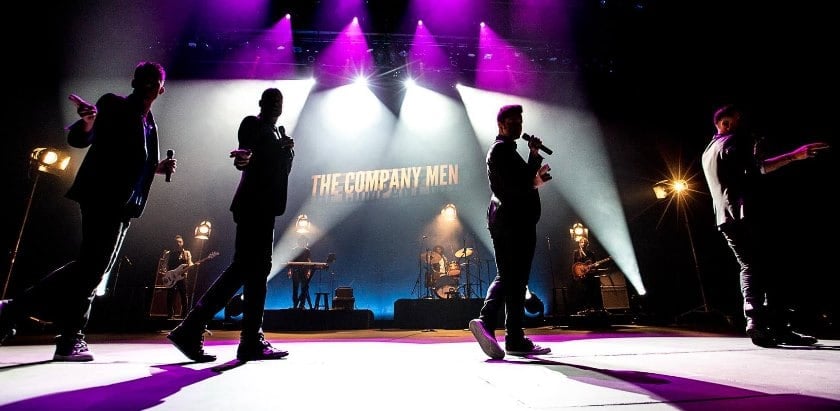 The Company Men - Corporate Entertainment - Banner Photo on stage - Funny Business Agency