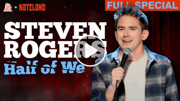 Steven Rogers performing stand-up on stage from Half of We comedy special