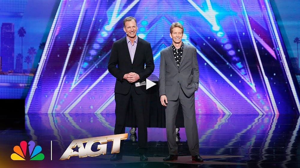 The Passing Zone juggling flaming clubs on America’s Got Talent stage with Howie Mandel